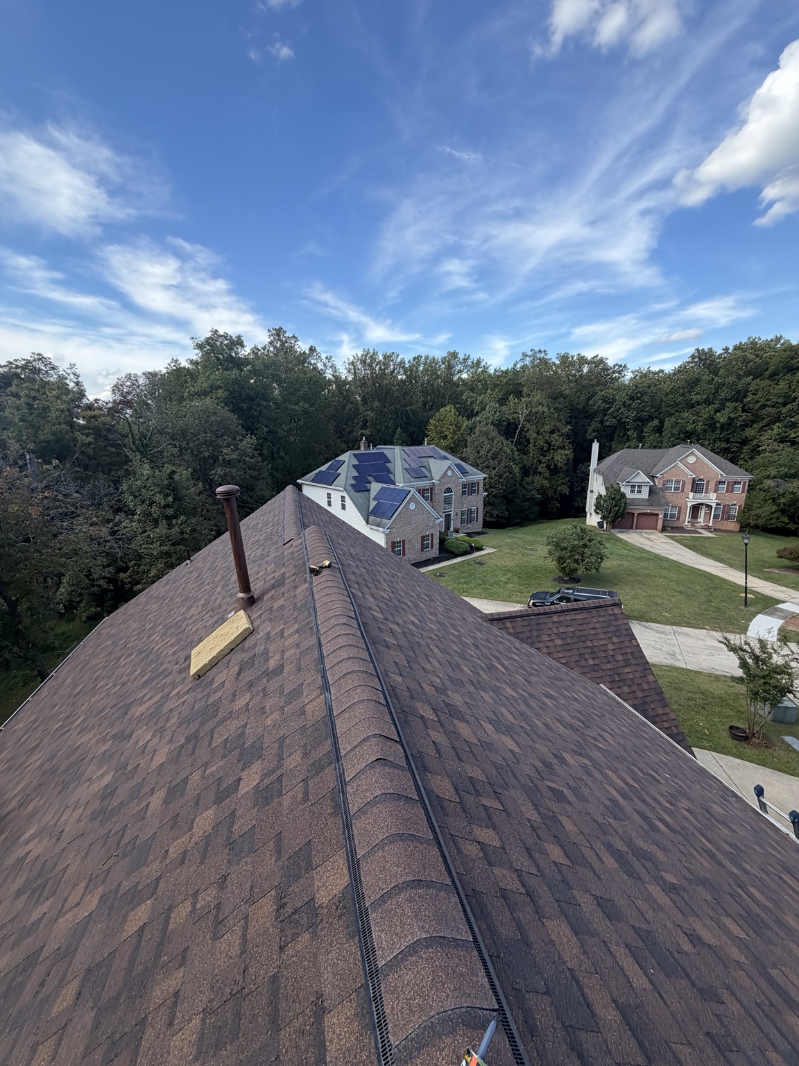 Completed brown shingle roof project