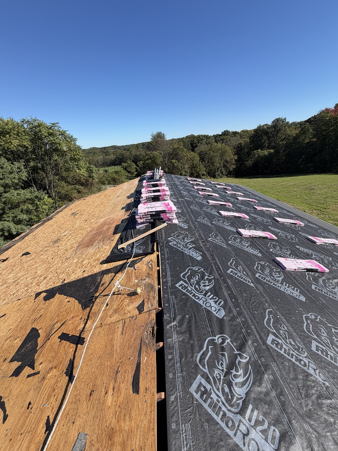 Roof replacement preparation with RhinoRoof underlayment