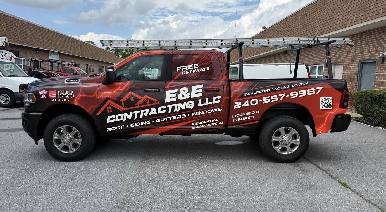 E&E Contracting LLC branded roofing truck